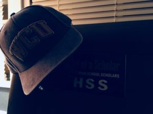 University Hat on Headboard