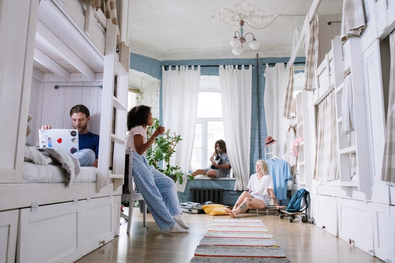 Men and Women inside Their Dorm Room