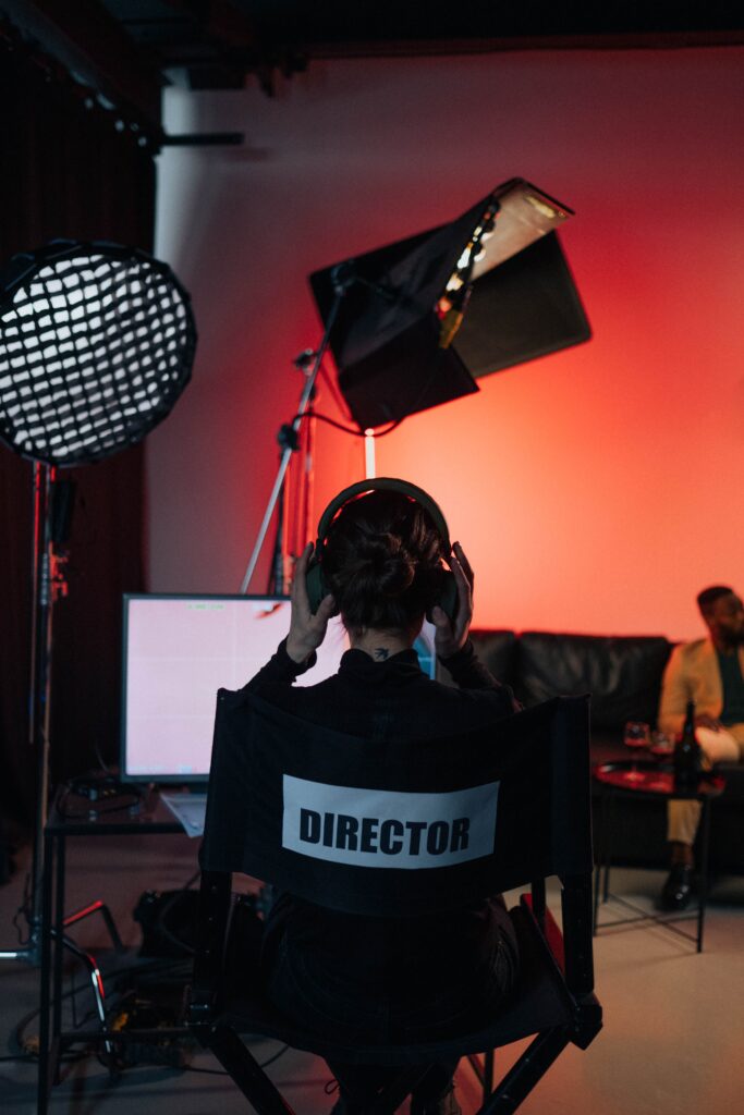 Woman in Director's chair on set